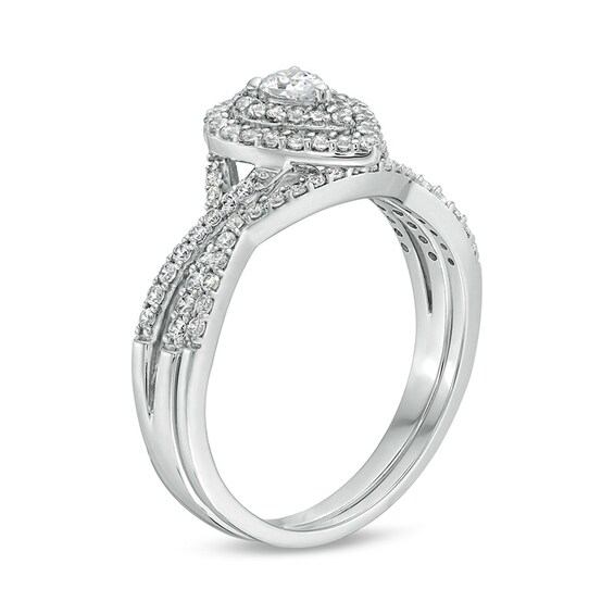 Previously Owned - 5/8 CT. T.w. Pear-Shaped Diamond Double Frame Twist Shank Soldered Bridal Set in 10K White Gold