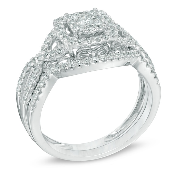 Previously Owned - 5/8 CT. T.w. Composite Diamond Frame Twist Shank Soldered Bridal Set in 10K White Gold