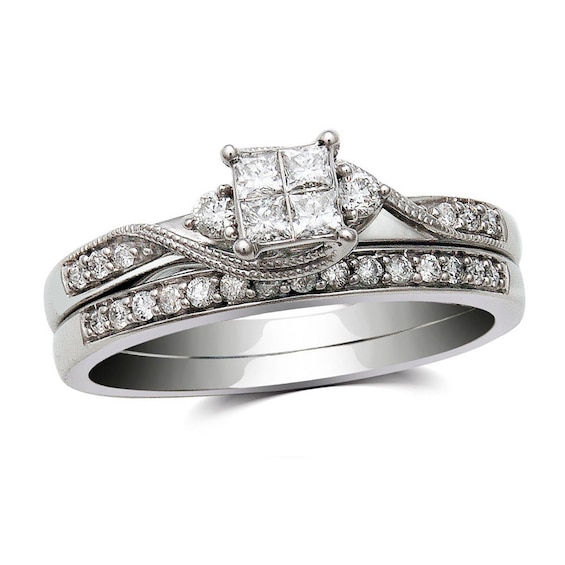 Previously Owned - 1/3 CT. T.w. Quad Princess-Cut Diamond Soldered Bridal Set in 10K White Gold