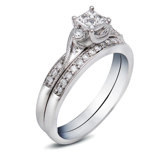 Previously Owned - 1/3 CT. T.w. Quad Princess-Cut Diamond Soldered Bridal Set in 10K White Gold
