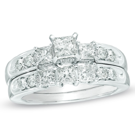 Previously Owned - 1-1/2 CT. T.w. Princess-Cut Diamond Three Stone Soldered Bridal Set in 14K White Gold
