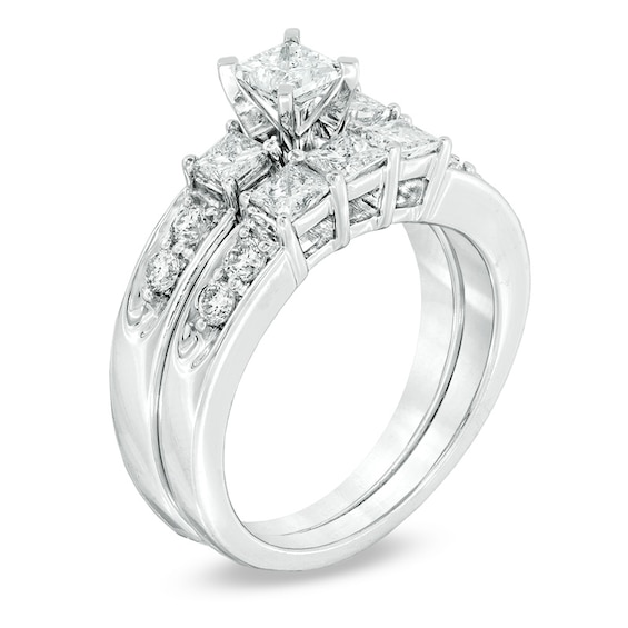 Previously Owned - 1-1/2 CT. T.w. Princess-Cut Diamond Three Stone Soldered Bridal Set in 14K White Gold