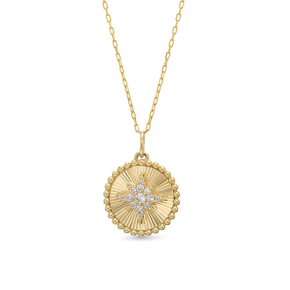 Previously Owned - 1/8 CT. T.w. Diamond Starburst Beaded Frame Medallion Pendant in 10K Gold