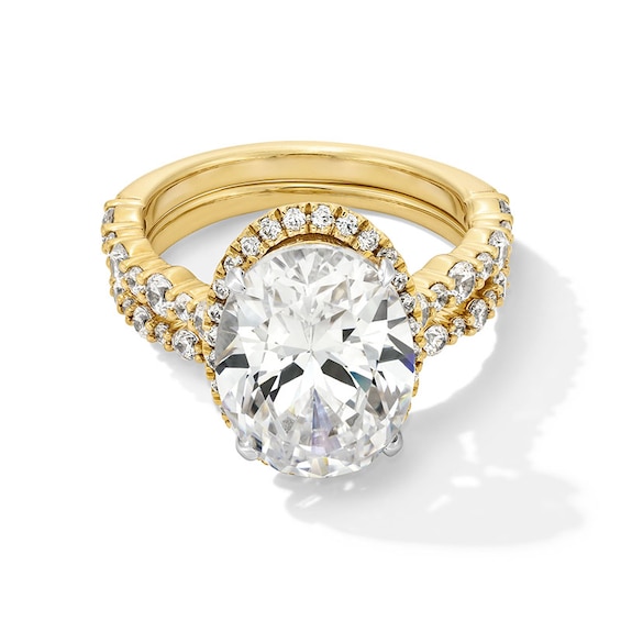 Previously Owned - 5 CT. T.w. Oval Lab-Grown Diamond Frame Alternating Shank Bridal Set in 14K Gold (F/Vs2)