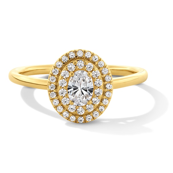 Previously Owned - 3/8 CT. T.w. Oval Lab-Grown Diamond Double Frame Promise Ring in 10K Gold (F/Si2)