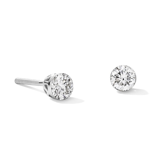 Previously Owned - 1/2 CT. T.w. Lab-Grown Diamond Solitaire Stud Earrings in 10K White Gold (F/Vs2)