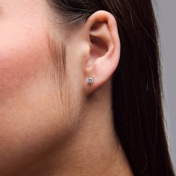 Previously Owned - 1/2 CT. T.w. Lab-Grown Diamond Solitaire Stud Earrings in 10K White Gold (F/Vs2)