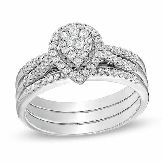 Previously Owned - 1/2 CT. T.w. Diamond Cluster Pear-Shaped Frame Three Piece Soldered Bridal Set in 10K White Gold
