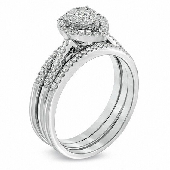 Previously Owned - 1/2 CT. T.w. Diamond Cluster Pear-Shaped Frame Three Piece Soldered Bridal Set in 10K White Gold