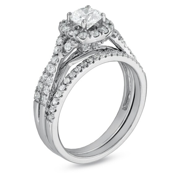 Previously Owned - 1-1/10 CT. T.w. Diamond Frame Twist Soldered Bridal Set in 14K White Gold