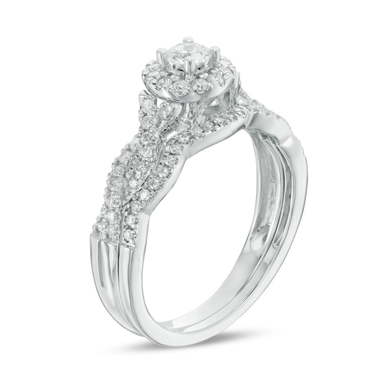 Previously Owned - 1/2 CT. T.w. Diamond Frame Twist Soldered Bridal Set in 10K White Gold