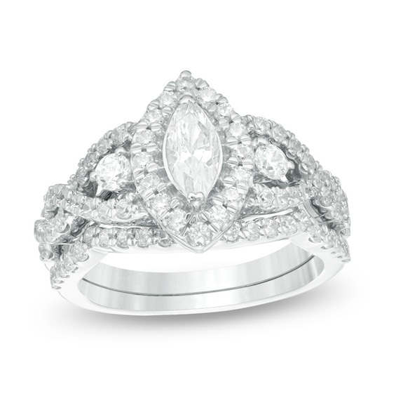 Previously Owned - 1-1/2 CT. T.w. Marquise Diamond Frame Twist Soldered Bridal Set in 10K White Gold