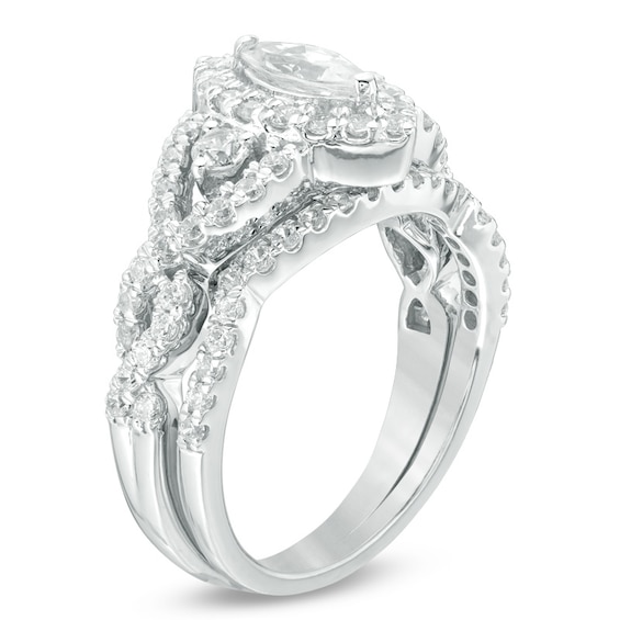 Previously Owned - 1-1/2 CT. T.w. Marquise Diamond Frame Twist Soldered Bridal Set in 10K White Gold