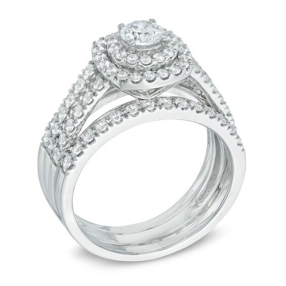 Previously Owned - 1-1/5 CT. T.w. Diamond Frame Three Piece Soldered Bridal Set in 14K White Gold