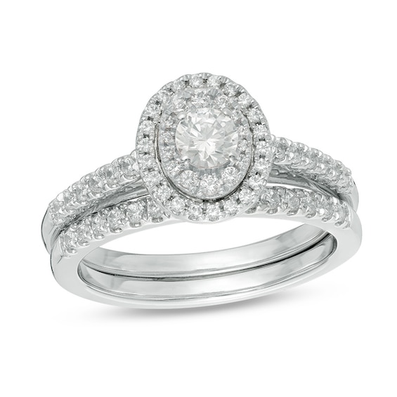 Previously Owned - 3/4 CT. T.w. Diamond Double Oval Frame Soldered Bridal Set in 14K White Gold