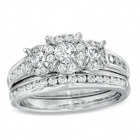 Previously Owned - 1 CT. T.w. Diamond Three Stone Soldered Bridal Set in 14K White Gold