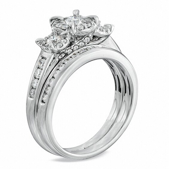 Previously Owned - 1 CT. T.w. Diamond Three Stone Soldered Bridal Set in 14K White Gold