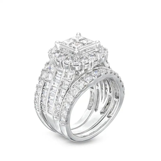 Previously Owned - 4 CT. T.w. Quad Princess-Cut Diamond Cushion Frame Three-Piece Soldered Bridal Set in 14K White Gold