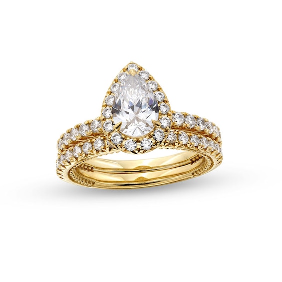 Previously Owned - 2 CT. T.w. Pear-Shaped Lab-Grown Diamond Frame Bridal Set in 14K Gold (F/Vs2)