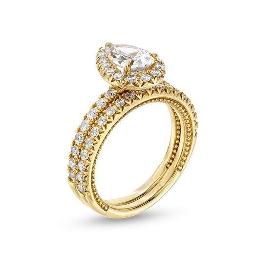 Previously Owned - 2 CT. T.w. Pear-Shaped Lab-Grown Diamond Frame Bridal Set in 14K Gold (F/Vs2)