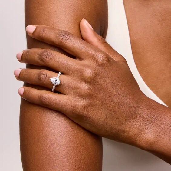 Previously Owned - 1-1/3 CT. T.w. Pear-Shaped Lab-Grown Diamond Frame Engagement Ring in 10K Gold (F/Si2)