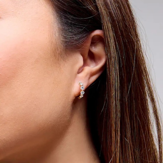 Previously Owned - 1 CT. T.w. Lab-Grown Diamond Graduated Five Stone Huggie Hoop Earrings in 10K Gold (F/Vs2)
