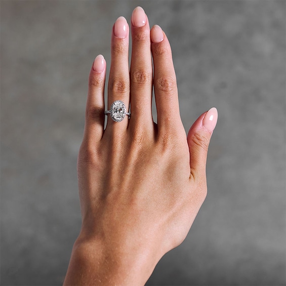 Previously Owned - 4-1/2 CT. T.w. Oval Lab-Grown Diamond Frame Engagement Ring in 14K White Gold (F/Vs2)