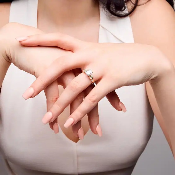 Previously Owned - Romantic Vine 1-1/3 CT. T.w. Oval Lab-Grown Diamond Engagement Ring in 14K Gold (F/Vs2)