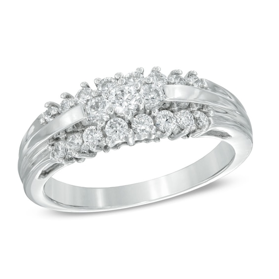 Previously Owned - 1/2 CT. T.w. Diamond Flower Ring in 10K White Gold