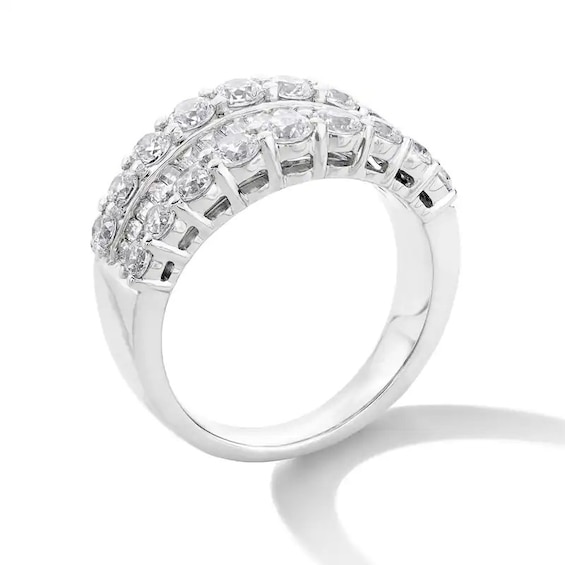 Previously Owned - 2 CT. T.w. Baguette and Round Diamond Graduated Triple Row Anniversary Band in 14K White Gold