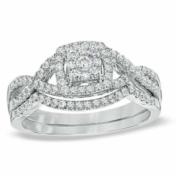 Previously Owned - 1/2 CT. T.w. Multi-Diamond Twist Shank Soldered Bridal Set in 10K White Gold