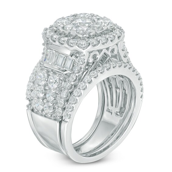 Previously Owned - 4 CT. T.w. Diamond Cluster Frame Three Piece Soldered Bridal Set in 14K White Gold