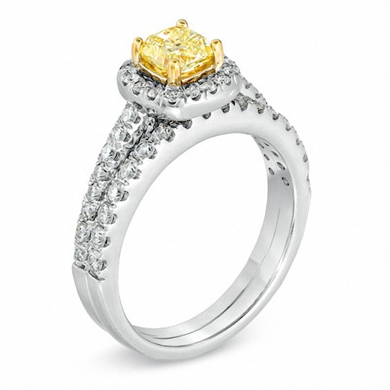 Previously Owned - 1-1/8 CT. T.w. Cushion-Cut Yellow Diamond Frame Soldered Bridal Set in 18K White Gold (P/Si2)