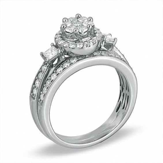 Previously Owned - 1 CT. T.w. Round and Princess-Cut Diamond Flower Soldered Bridal Set in 10K White Gold