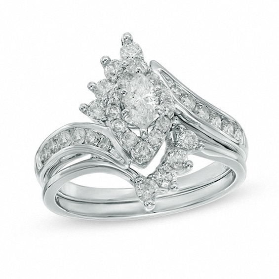 Previously Owned - 1 CT. T.w. Marquise Diamond Shadow Frame Soldered Bridal Set in 14K White Gold
