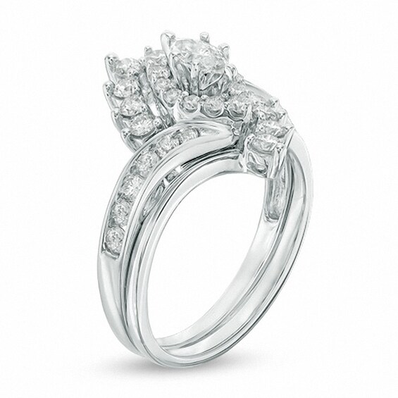 Previously Owned - 1 CT. T.w. Marquise Diamond Shadow Frame Soldered Bridal Set in 14K White Gold