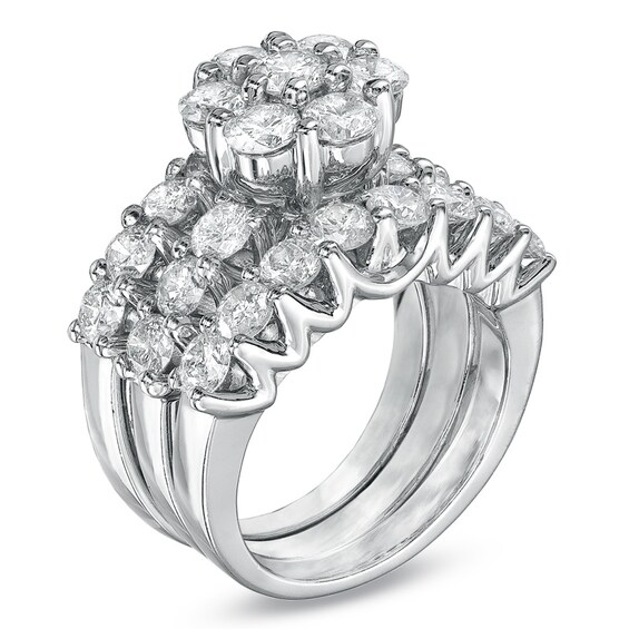 Previously Owned - 4 CT. T.w. Diamond Soldered Bridal Set in 14K White Gold