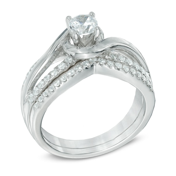 Previously Owned - 3/4 CT. T.w. Diamond Swirl Soldered Bridal Set in 14K White Gold