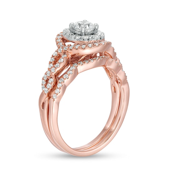 Previously Owned - 1 CT. T.w. Diamond Double Oval Frame Twist Shank Soldered Bridal Set in 10K Rose Gold
