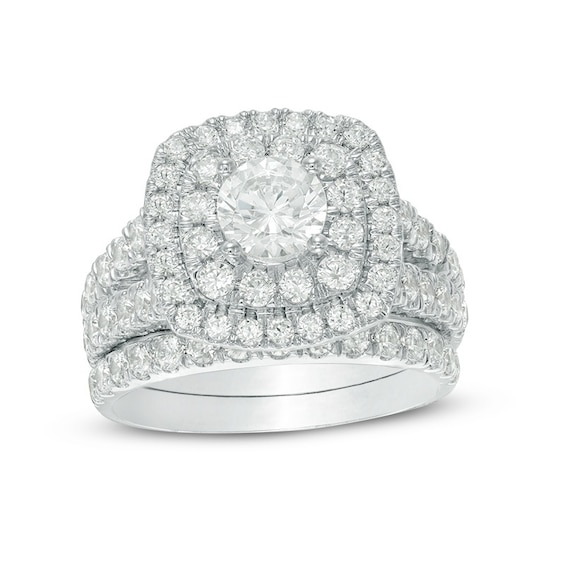 Previously Owned - 2-1/2 CT. T.w. Diamond Double Cushion Frame Soldered Bridal Set in 14K White Gold (I/I2)