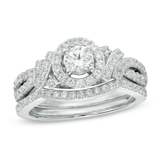 Previously Owned - Celebration Ideal 1 CT. T.w. Diamond Frame Soldered Bridal Set in 14K White Gold (I/I1)