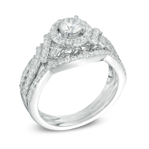Previously Owned - Celebration Ideal 1 CT. T.w. Diamond Frame Soldered Bridal Set in 14K White Gold (I/I1)
