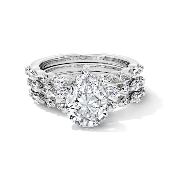 Previously Owned - 3-1/3 CT. T.w. Pear-Shaped Lab-Grown Diamond Three-Piece Bridal Set in 14K White Gold (F/Vs2)
