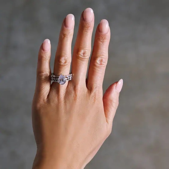 Previously Owned - 3-1/3 CT. T.w. Pear-Shaped Lab-Grown Diamond Three-Piece Bridal Set in 14K White Gold (F/Vs2)