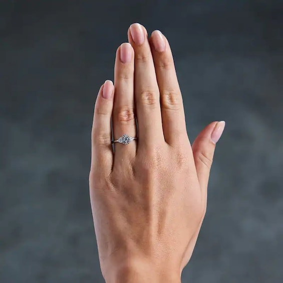 Previously Owned - 1/3 CT. T.w. Lab-Grown Diamond Halo Promise Ring in 10K White Gold (F/Si2)