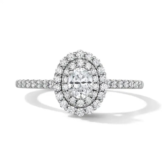 Previously Owned - 1/2 CT. T.w. Oval Lab-Grown Diamond Double Frame Promise Ring in 10K White Gold (F/Si2)