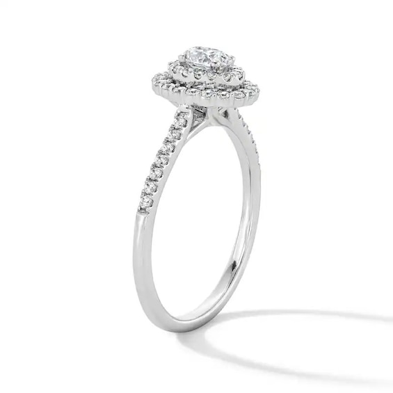 Previously Owned - 1/2 CT. T.w. Oval Lab-Grown Diamond Double Frame Promise Ring in 10K White Gold (F/Si2)