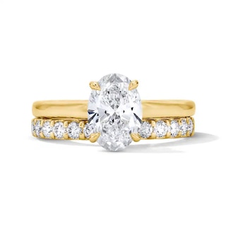 Previously Owned - 2 CT. T.W. Oval Lab-Grown Diamond Hidden Frame Bridal Set in 14K Gold (F/VS2)