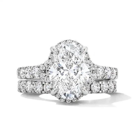 Previously Owned - 4-1/2 CT. T.w. Oval Lab-Grown Diamond Frame Bridal Set in 14K White Gold (F/Vs2)