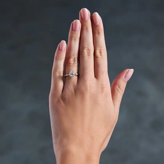 Previously Owned - Modern Reflection 1 CT. T.w. Oval Lab-Grown Diamond Frame Engagement Ring in 14K Gold (F/Vs2)